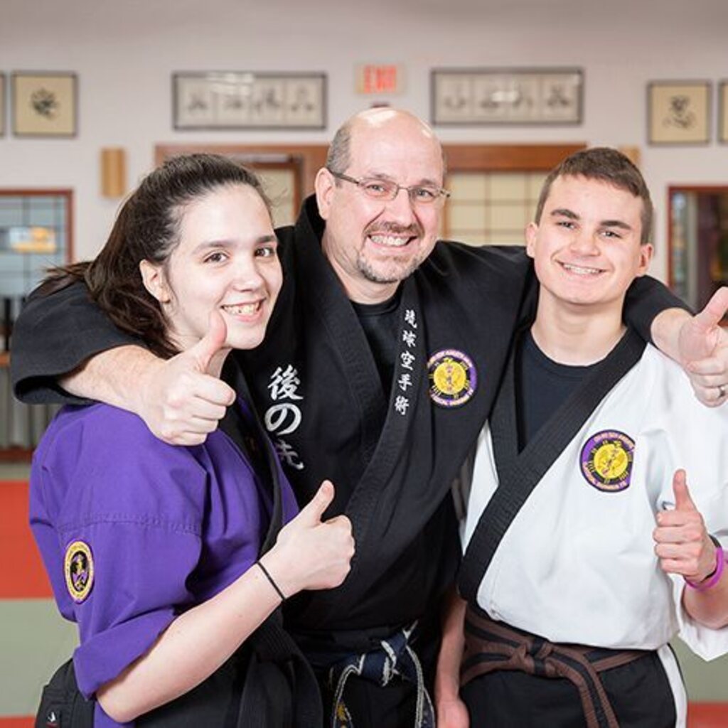 An instructor supervising Get Strong. students closely during class at Go No Sen Karate in Peekskill