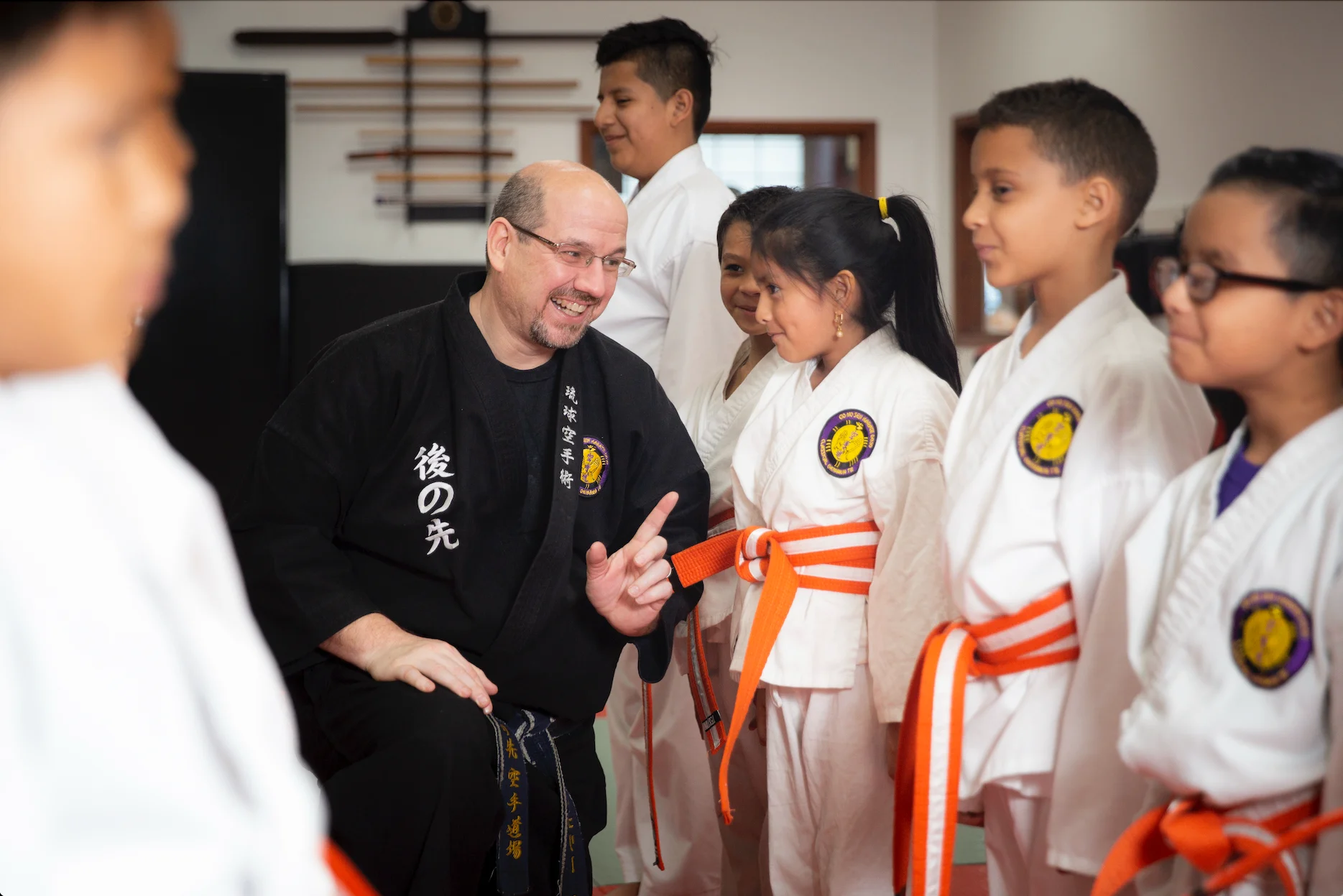 Students of all ages lined up together after class at Go No Sen Karate in Peekskill